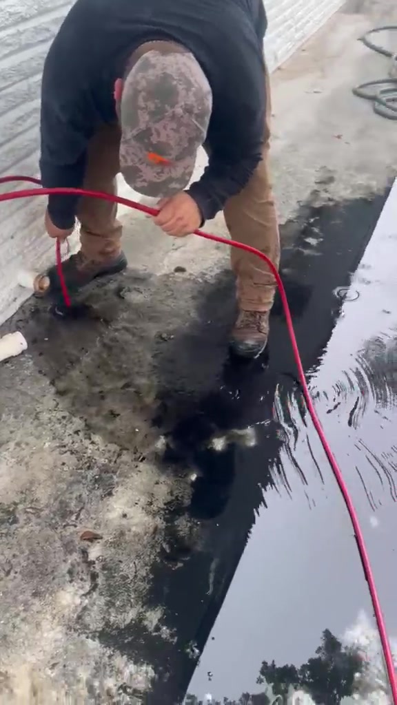 Texas Premier Plumbing technician performing drain cleaning service in Houston TX